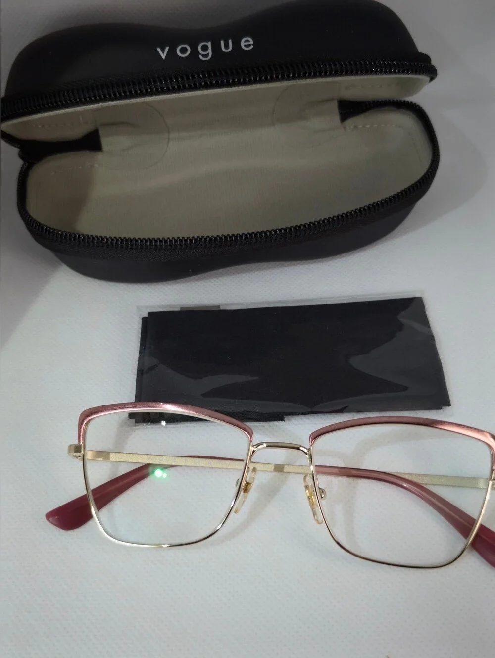 Vogue. Stylish Cat-Eye Metal Frame Glasses in Rose Gold Silk Texture.